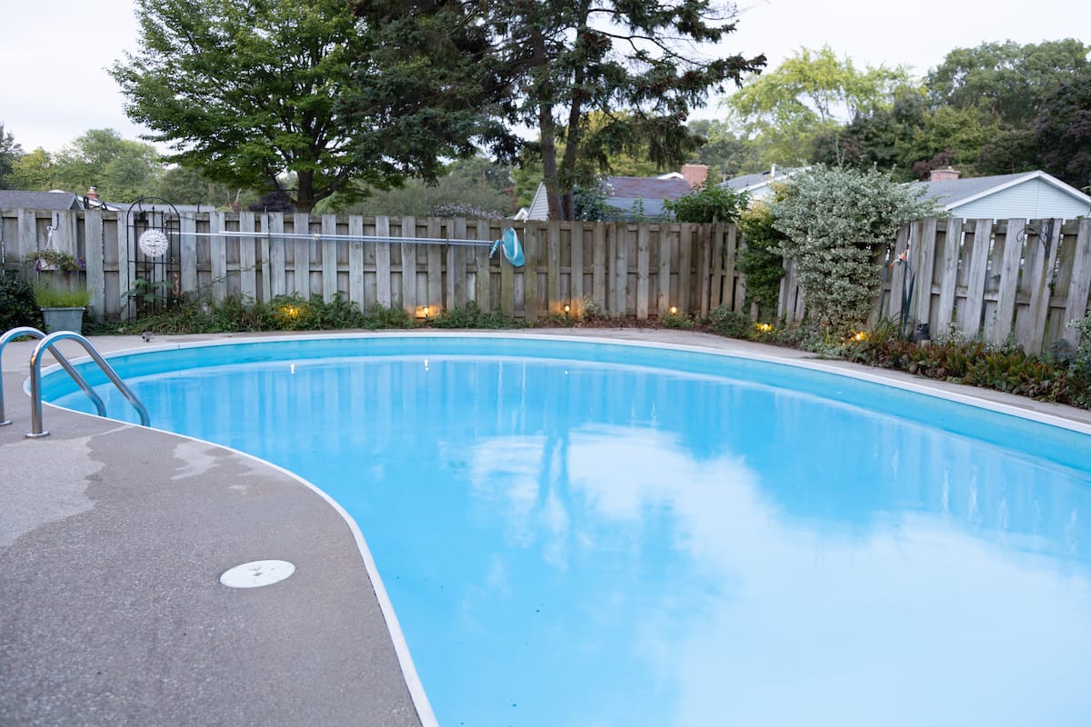 Spacious deck with string lights for evening dining